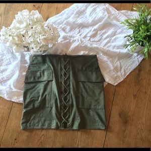 Form fitting green mini skirt